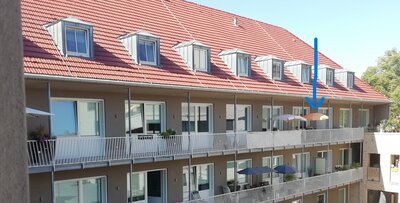 ein Haus mit außenansicht auf die Balkone